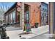Attractive restaurant entrance with eye-catching signage and a cozy outdoor ambiance, ideal for drinks at 1907 W Elk Pl, Denver, CO 80211