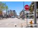 Street view showcasing the vibrant Tennyson Street neighborhood with retail shops, restaurants, and pedestrian activity at 1907 W Elk Pl, Denver, CO 80211