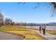 Scenic paved walking path along the lake, ideal for jogging, walking, and enjoying the outdoors at 1907 W Elk Pl, Denver, CO 80211