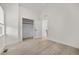 Bright bedroom with vaulted ceilings, skylight, closet and a doorway to another room at 1907 W Elk Pl, Denver, CO 80211