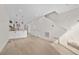Spacious, open-concept floor plan featuring a modern kitchen and a bright living area at 1907 W Elk Pl, Denver, CO 80211