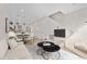 Cozy living space adjacent to the kitchen, featuring modern decor and natural light at 1907 W Elk Pl, Denver, CO 80211