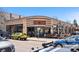 Exterior view of a brick restaurant showcasing large windows and outdoor seating area at 1907 W Elk Pl, Denver, CO 80211