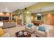 A spacious basement featuring a sitting area, a wet bar, and an open area at 8286 W 108Th Pl, Broomfield, CO 80021