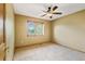 A cozy bedroom featuring neutral walls, carpet flooring, and a window with natural light at 8286 W 108Th Pl, Broomfield, CO 80021