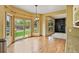 Bright dining area with hardwood floors, a chandelier, and access to the backyard at 8286 W 108Th Pl, Broomfield, CO 80021