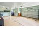 Spacious three car garage with storage shelves, utility sink and three overhead doors at 8286 W 108Th Pl, Broomfield, CO 80021