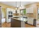 Updated kitchen featuring a center island and stainless steel appliances at 8286 W 108Th Pl, Broomfield, CO 80021