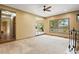 Cozy living room filled with natural light, featuring plush carpeting at 8286 W 108Th Pl, Broomfield, CO 80021