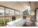 Enjoy evenings under the covered deck with overhead lighting and a backyard view, perfect for outdoor entertainment and relaxation at 9911 Perry Ct, Westminster, CO 80031
