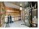 Utility room with updated mechanical systems, cabinets, and tile flooring for easy maintenance at 9911 Perry Ct, Westminster, CO 80031