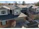 This aerial view showcases the home's roof, attached garage, and brick accents at 3548 W 126Th Pl, Broomfield, CO 80020
