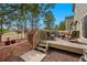 The back deck has an outdoor sitting area with yard access and landscape views at 3548 W 126Th Pl, Broomfield, CO 80020