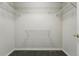 Walk-in closet with carpeted floor and white wire shelving, offering ample storage space at 3548 W 126Th Pl, Broomfield, CO 80020
