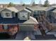 Charming townhouse showcasing a well-kept yard, two-car garage and a gray roof at 3548 W 126Th Pl, Broomfield, CO 80020