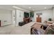 Finished basement living room with television, carpeted floor, and cozy seating, perfect for relaxing at 3548 W 126Th Pl, Broomfield, CO 80020