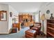 Upstairs office area includes a wooden bookcase, desk, and leather chair at 3548 W 126Th Pl, Broomfield, CO 80020