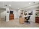 Basement office area boasts a large desk, storage options, and a cozy carpeted space at 3548 W 126Th Pl, Broomfield, CO 80020