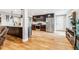 Well-equipped kitchen with stainless steel appliances, dark wood cabinetry, and plenty of counter space at 14290 W 54Th Ave, Arvada, CO 80002
