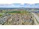 Scenic aerial view of neighborhood with Denver skyline in the distance on a sunny day at 2019 S Fox St, Denver, CO 80223