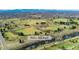 Overhead shot of Ruby Hill Park with baseball fields, green spaces, and a winding river at 2019 S Fox St, Denver, CO 80223