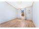 Bedroom with luxury vinyl plank flooring and large window providing natural light at 2019 S Fox St, Denver, CO 80223