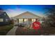 Charming single-story home featuring a cozy front porch, mature landscaping, and a fresh exterior paint job at 2019 S Fox St, Denver, CO 80223