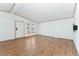 Bright and spacious living room with clean white walls and wood flooring at 2019 S Fox St, Denver, CO 80223