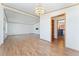 Bright living room featuring wood floors and an open floor plan at 2019 S Fox St, Denver, CO 80223