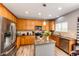 Spacious kitchen featuring stainless steel appliances and granite countertops at 5794 S Yakima Way, Aurora, CO 80015
