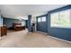 Large main bedroom featuring neutral carpet and an ensuite bathroom at 5794 S Yakima Way, Aurora, CO 80015