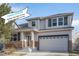 Charming two-story home with stone accents, a covered porch, and an attached two-car garage with open house banner at 23841 E Alabama Dr, Aurora, CO 80018
