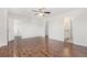 Large main bedroom with hardwood floors and adjacent bathroom and walk-in closet at 23841 E Alabama Dr, Aurora, CO 80018