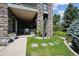 Inviting backyard with stone pillars and patio area, perfect for outdoor gatherings and relaxation at 23545 E Phillips Pl, Aurora, CO 80016