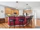 Spacious kitchen with breakfast bar, stainless appliances, and hardwood floors at 23545 E Phillips Pl, Aurora, CO 80016