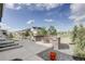 Backyard featuring a fire pit, seating area, and view of the community at 27655 E Geddes Pl, Aurora, CO 80016
