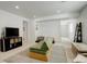 Finished basement with plush carpeting, recessed lighting, and entertainment area at 27655 E Geddes Pl, Aurora, CO 80016