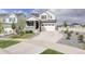 Charming two-story home with a two-car garage, inviting porch, and landscaped front yard at 27655 E Geddes Pl, Aurora, CO 80016