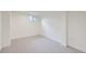 Finished basement room with neutral carpet and a small window providing natural light at 11981 E Yale Ave, Aurora, CO 80014