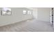 Sunny bedroom with carpet and ample natural light at 11981 E Yale Ave, Aurora, CO 80014