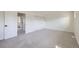 Spacious bedroom with carpet and walk-in closet at 11981 E Yale Ave, Aurora, CO 80014