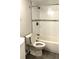 Clean bathroom features a shower and bathtub combination with bright white tile at 1470 S Quebec Way # 275, Denver, CO 80231