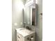 Updated bathroom featuring a vanity with marble countertop and bronze fixtures at 1470 S Quebec Way # 275, Denver, CO 80231