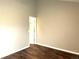 Cozy bedroom with modern wood floors and neutral wall color at 1470 S Quebec Way # 275, Denver, CO 80231