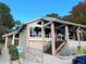 Community center exterior with wheelchair access and landscaping at 1470 S Quebec Way # 275, Denver, CO 80231