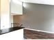 Enjoy the airy feel of this living room with high ceilings, lots of light, and stairs to the second floor at 1470 S Quebec Way # 275, Denver, CO 80231