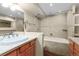 Bathroom featuring a vanity, tile floor, and separate shower and tub at 777 N Washington St # 204, Denver, CO 80203
