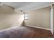 Neutral bedroom with carpet flooring, a single window, and a closet with sliding doors at 777 N Washington St # 204, Denver, CO 80203