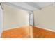 Bedroom featuring hardwood floors, a window, and natural light at 777 N Washington St # 204, Denver, CO 80203