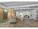 Comfortable lobby seating with modern lighting and tiled floors at 777 N Washington St # 204, Denver, CO 80203